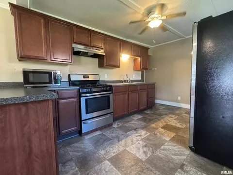 Kitchen - 410 E Summit St, Macomb, IL 61455 photo 2 of 3