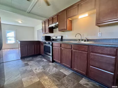 Kitchen - 410 E Summit St, Macomb, IL 61455 photo 1 of 3
