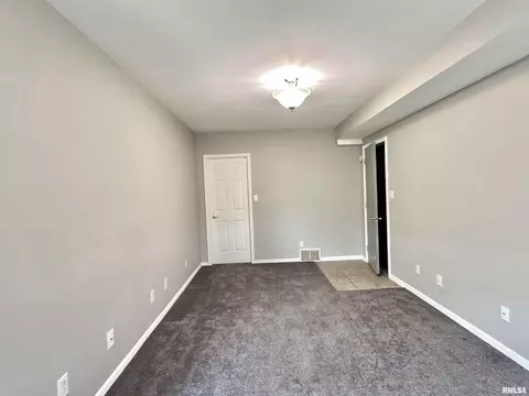 Living - 1215 E Chestnut St, Canton, IL 61520 photo 1 of 4
