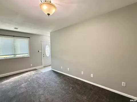 Living - 1215 E Chestnut St, Canton, IL 61520 photo 3 of 4