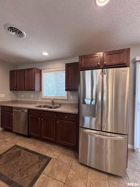 Kitchen - 106 Holden Ter, Macomb, IL 61455 photo 5 of 7