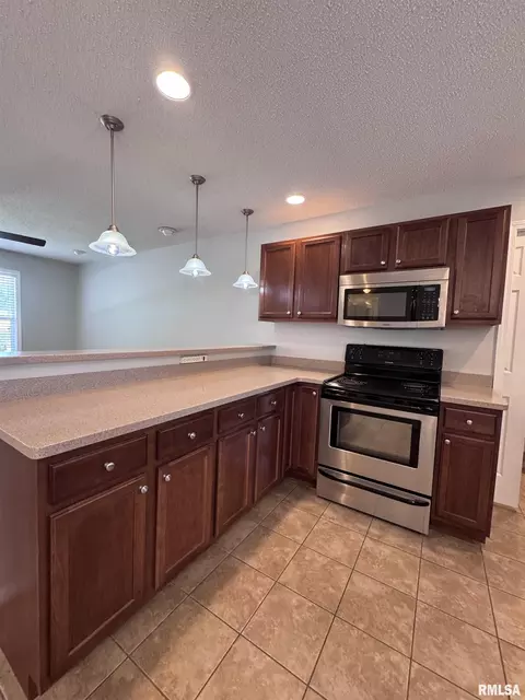 Kitchen - 106 Holden Ter, Macomb, IL 61455 photo 4 of 7