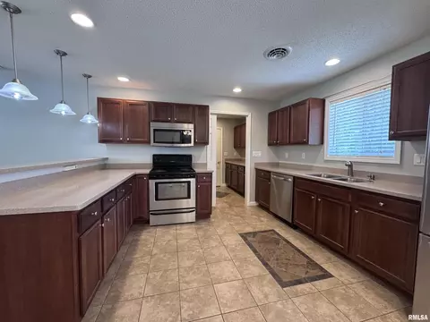 Kitchen - 106 Holden Ter, Macomb, IL 61455 photo 3 of 7