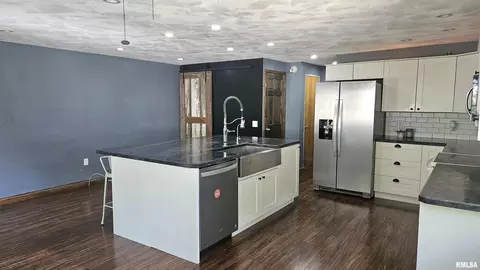Kitchen - 107 E Olive St, Canton, IL 61520 photo 3 of 5