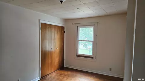 Bedroom - 107 E Olive St, Canton, IL 61520 photo 6 of 8