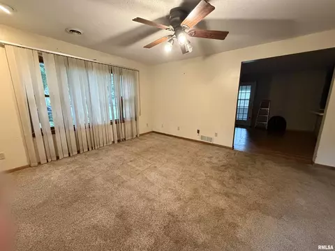 Living - 704 E Calhoun St, Macomb, IL 61455 photo 2 of 3