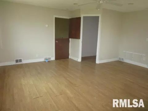 Living - 402 S 7th St, Pekin, IL 61554 photo 3 of 4