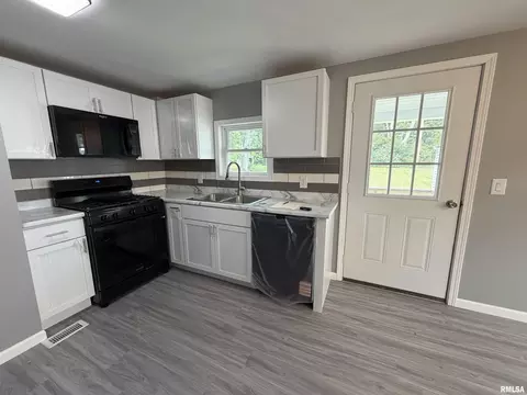 Kitchen - 720 E Carroll St, Macomb, IL 61455 photo 2 of 2