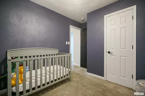 Bedroom - 1217 E Locust St, Canton, IL 61520 photo 2 of 6