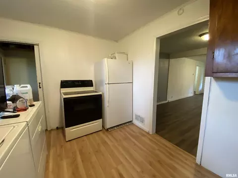 Kitchen - 125 E Beech St, Canton, IL 61520 photo 2 of 2