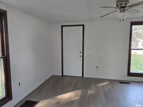 Living - 1025 E Oak St, Macomb, IL 61455 photo 1 of 2