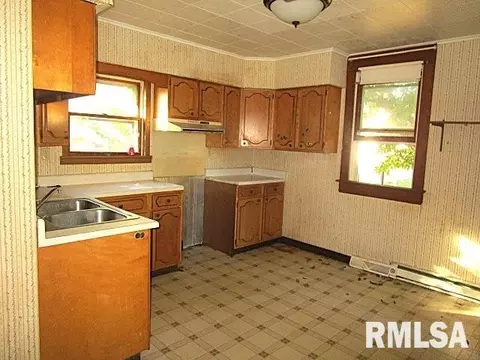 Kitchen - 49 W Ash St, Canton, IL 61520 photo 2 of 2
