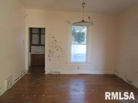 Living - 49 W Ash St, Canton, IL 61520 photo 2 of 2