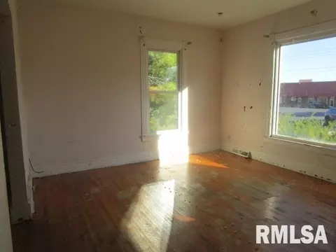 Living - 49 W Ash St, Canton, IL 61520 photo 1 of 2