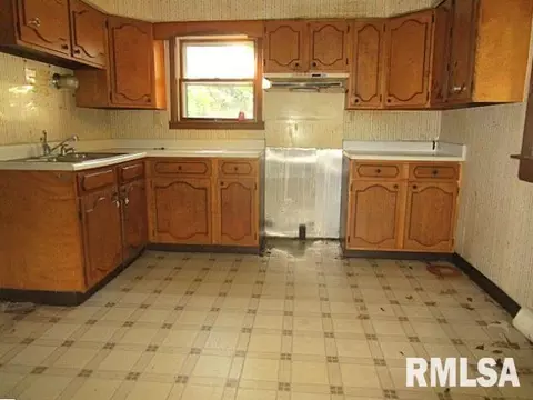 Kitchen - 49 W Ash St, Canton, IL 61520 photo 1 of 2