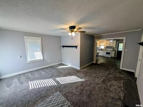 Living - 1028 E Oak St, Macomb, IL 61455 photo 1 of 2