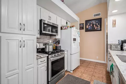 Kitchen - 1335 Samra Ave, Lancaster, CA 93535 photo 2 of 2