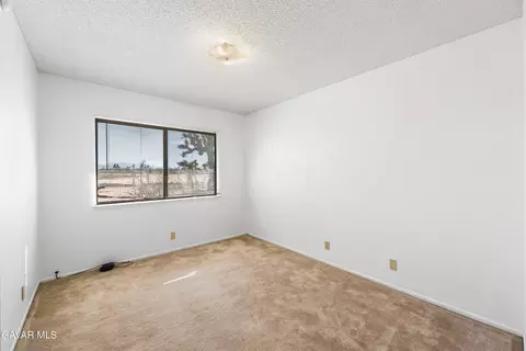 Bedroom - 23073 E Avenue J, Lancaster, CA 93535 photo 1 of 8