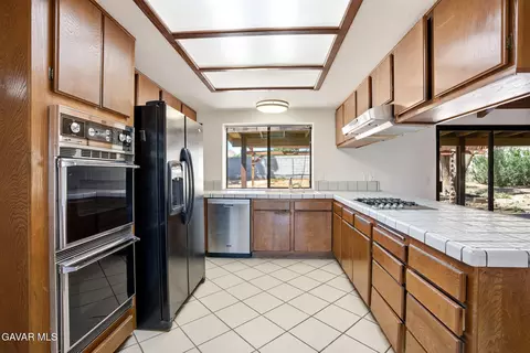 Kitchen - 39005 E 161st St, Lake Los Angeles, CA 93591 photo 2 of 3