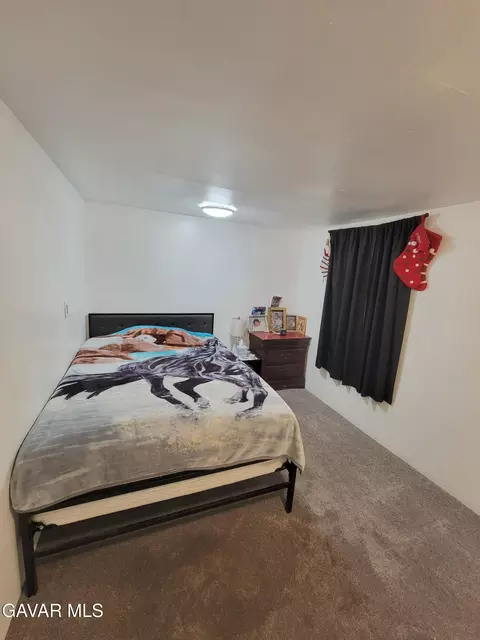 Bedroom - 45541 E 30th St #7, Lancaster, CA 93535 photo 2 of 4