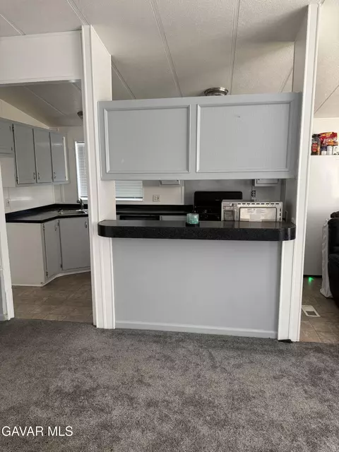 Kitchen - 45111 25th St #SPC 25, Lancaster, CA 93535 photo 1 of 4