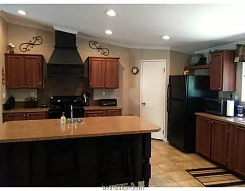 9541 E Timberwilde Dr, Bryan, TX 77808 photo 3