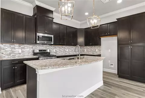 Kitchen - 4655 S Stonecrest Ct, Bryan, TX 77808 photo 3 of 4