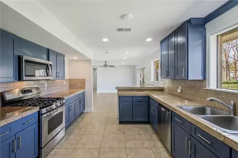 Kitchen - 406 Tee Dr, Bryan, TX 77801 photo 3 of 3