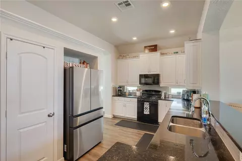 Kitchen - 2047 Positano Loop, Bryan, TX 77808 photo 2 of 3