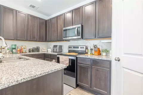 Kitchen - 990 Harper Ln, Bryan, TX 77803 photo 1 of 2