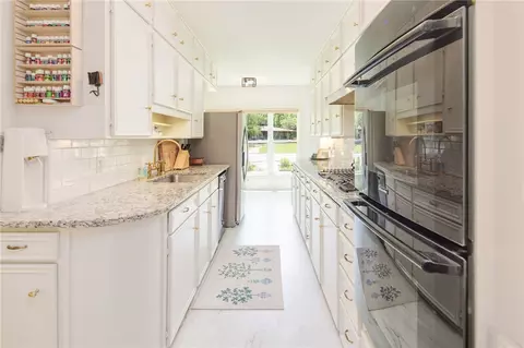 Kitchen - 301 Hensel Ave, Bryan, TX 77801 photo 2 of 3