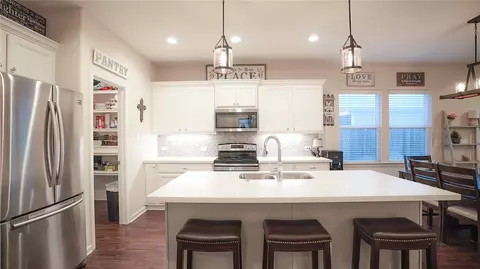 Kitchen - 2113 Mountain Wind Loop, Bryan, TX 77807 photo 2 of 5