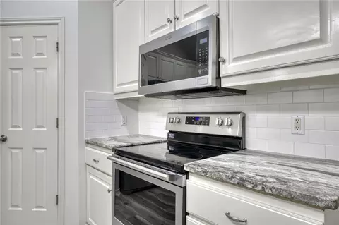 Kitchen - 7665 Planters Loop, Bryan, TX 77808 photo 3 of 3