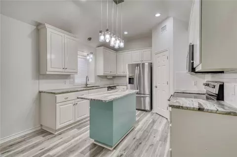 Kitchen - 7665 Planters Loop, Bryan, TX 77808 photo 1 of 3