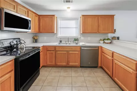 Kitchen - 1733 Rock Hollow Loop, Bryan, TX 77807 photo 2 of 3