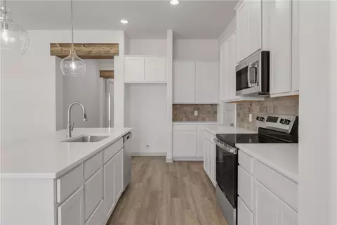 Kitchen - 3577 Pointe Du Hoc Loop, Bryan, TX 77808 photo 3 of 3