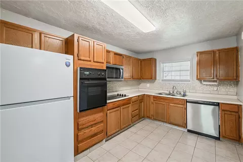 Kitchen - 1302 E 23rd St, Bryan, TX 77803 photo 2 of 3