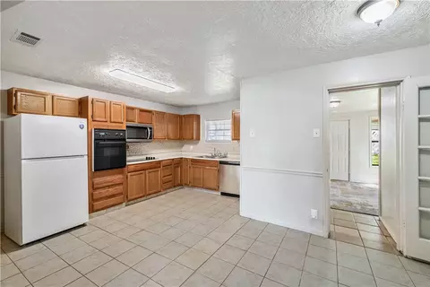 Kitchen - 1302 E 23rd St, Bryan, TX 77803 photo 1 of 3