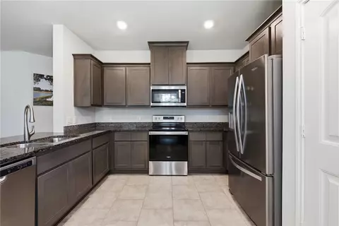 Kitchen - 1933 Cartwright St, Bryan, TX 77807 photo 2 of 2