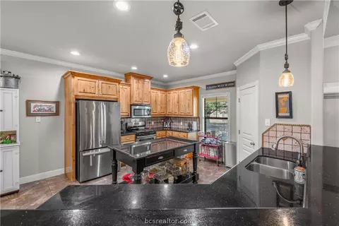 Kitchen - 8748 Tejas Ranch Loop, Bryan, TX 77808 photo 2 of 6