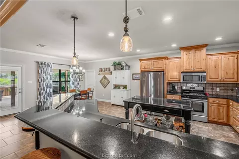 Kitchen - 8748 Tejas Ranch Loop, Bryan, TX 77808 photo 5 of 6