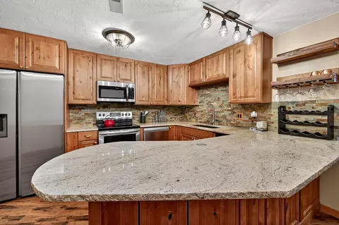 Kitchen - 117 E Steam Engine Dr #8A, Brian Head, UT 84719 photo 4 of 5