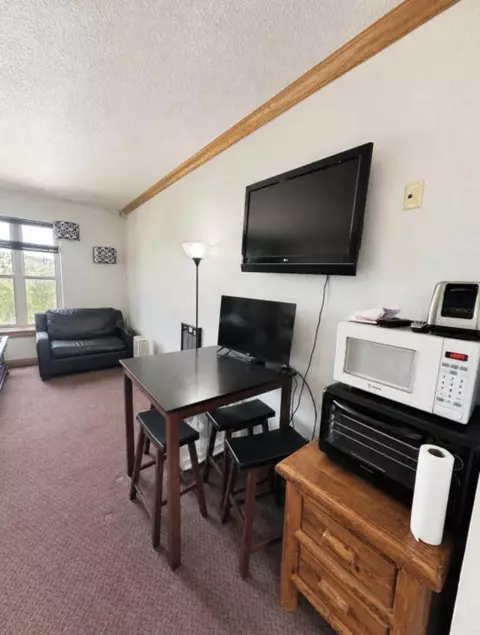 Dining - 223 W Hunter Ridge Dr #A213, Brian Head, UT 84719 photo 1 of 2