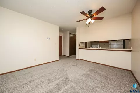 Living - 1411 E Rushmore Dr, Brandon, SD 57005 photo 2 of 7