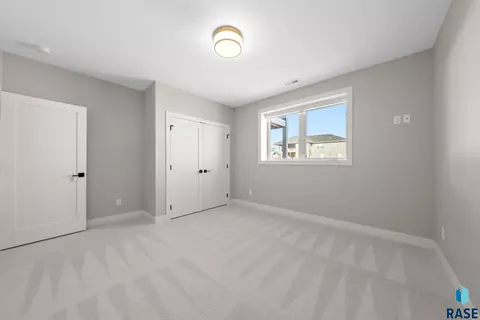 Bedroom - 7400 E Shadow Pine Cir, Sioux Falls, SD 57110 photo 7 of 10