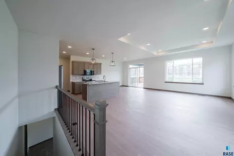 Living - 7233 E Waters Edge Pl, Sioux Falls, SD 57110 photo 1 of 4