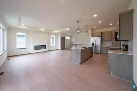 Living - 7233 E Waters Edge Pl, Sioux Falls, SD 57110 photo 2 of 4