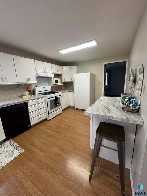 Kitchen - 813 E Center St, Madison, SD 57042 photo 2 of 8