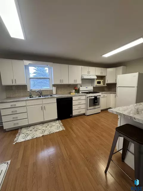 Kitchen - 813 E Center St, Madison, SD 57042 photo 1 of 8