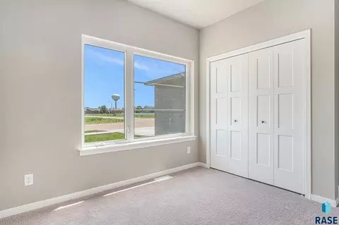 Bedroom - 1121 Cyber Ct, Madison, SD 57042 photo 4 of 4